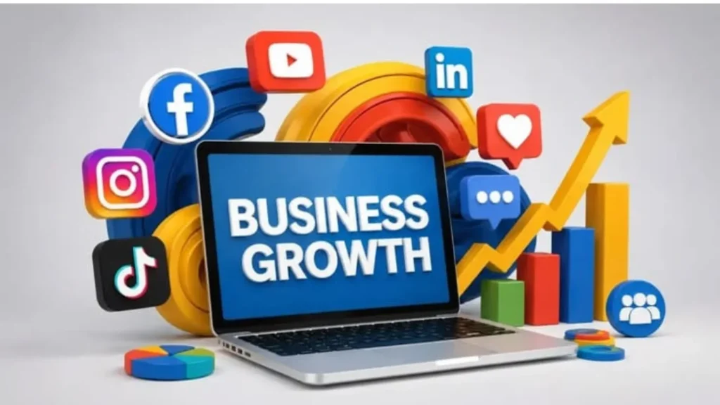Small business owner planning a social media marketing strategy using a laptop and smartphone.