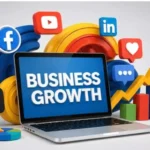 Small business owner planning a social media marketing strategy using a laptop and smartphone.