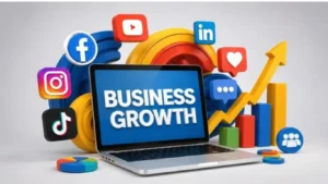 Small business owner planning a social media marketing strategy using a laptop and smartphone.